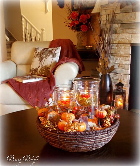 Use artistic techniques to design the look, such as striking a balance with symmetry and composing a color story or style. Dining Delight: Fall Coffee Table Centerpiece