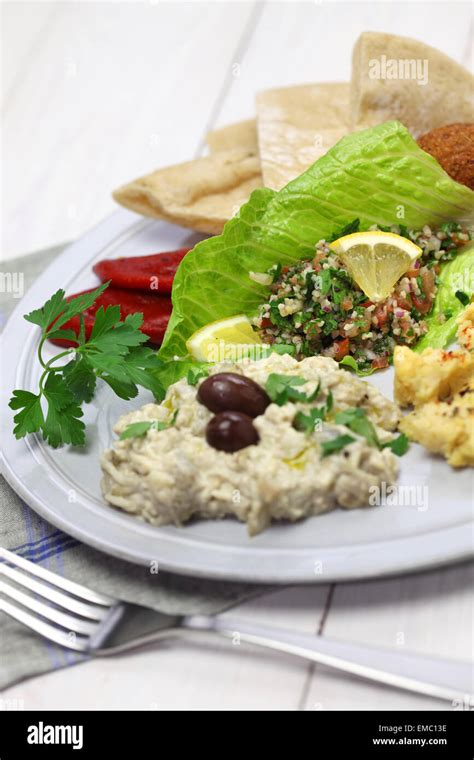 Hummus Falafel Baba Ghanoush Tabbouleh And Pita Middle Eastern