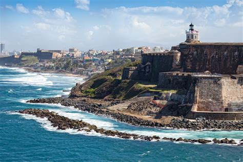 San juan puerto rico woman enjoying view el morro fort castillo de san felipe del morro strong and beautiful, this fort has helped guard the shore for nearly five centuries while overlooking some of the island's best scenery. San Juan, Puerto Rico, Travel Guide: Restaurants, Shopping ...