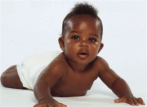 Very Cute Black Baby Boy Of African Descent Almost Smiling Books