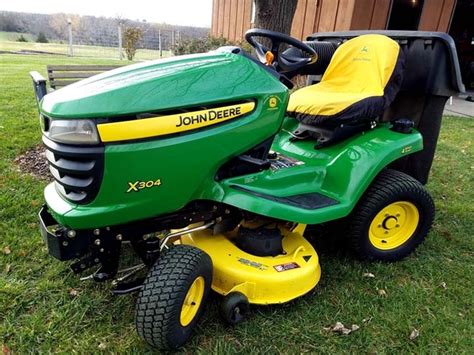 John Deere X304 Lawn Tractor 4 Wheel Steer With Bagger Nex Tech