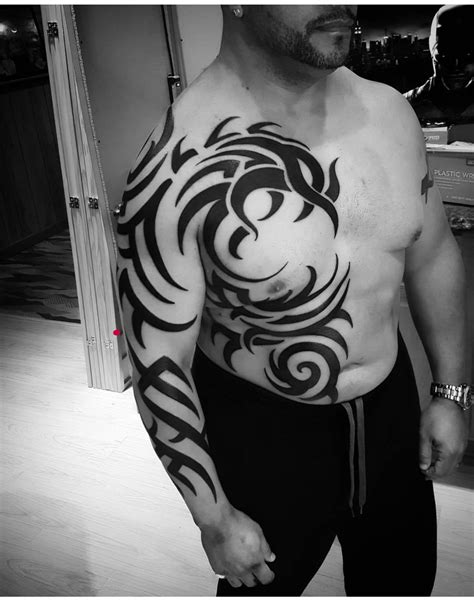 tribal-phoenix-by-tattoos-by-faime-tribal-sleeve-tattoos,-tribal-tattoos,-cool-half-sleeve-tattoos