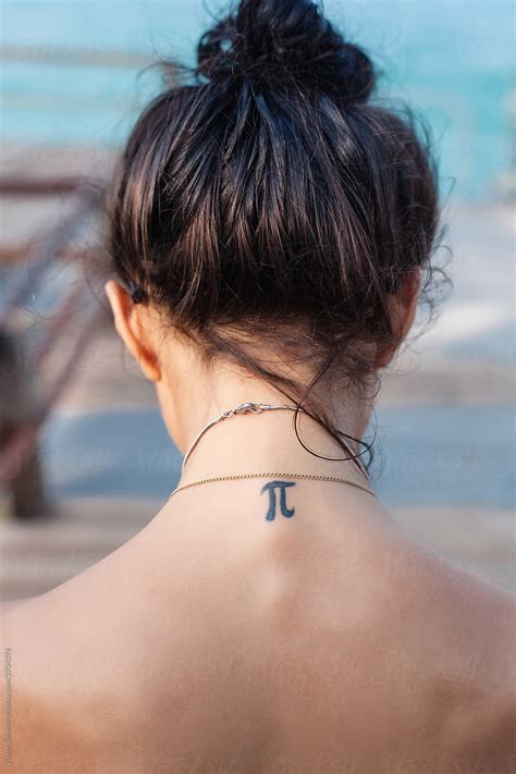 Closeup Back Side Portrait Of Tanned Woman Naked Back With Pi Sign