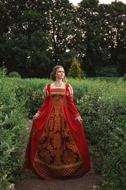 Premium Photo Beautiful Young Woman In A Red Medieval Dress Is