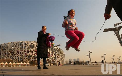A Chinese Girl Jump Ropes On The 2008 Olympic Green In Beijing China