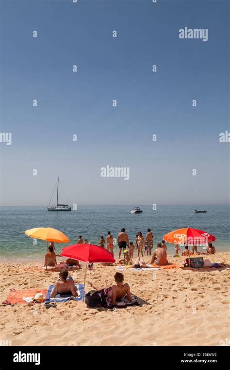 Algarve Beach People Sunbathing On Praia Da Marinha Marinha Beach