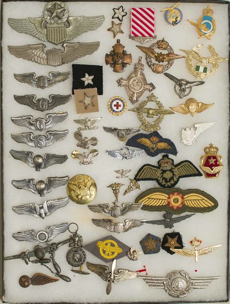 Us Wings And Medals Incl A Navy Cross Planchet Along With A Number