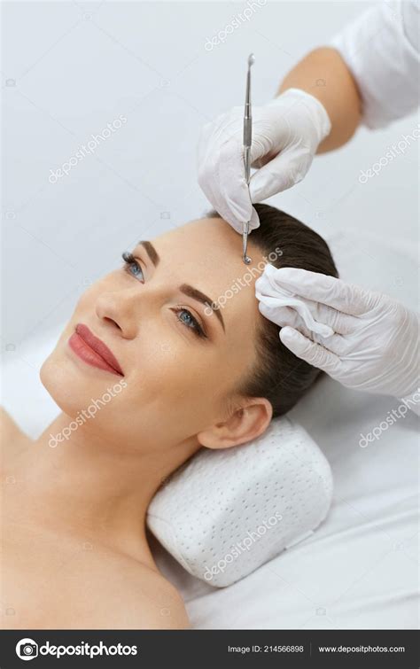 Beauty Woman On Mechanical Facial Cleansing At Cosmetology Stock Photo