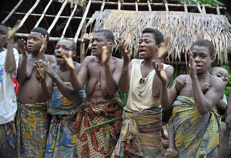 People From A Tribe Of Baka Pygmies In Village Of Ethnic Singing