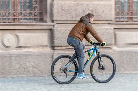 man riding his bicycle editorial photography image of architecture 143046027