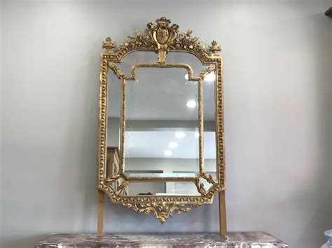 Beau miroir ancien au mercure de style Louis XVI a parecloses datant de ...