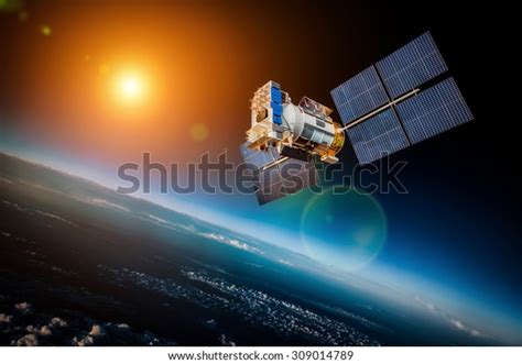 Space Satellite Orbiting Earth On Background Stock Photo Edit Now