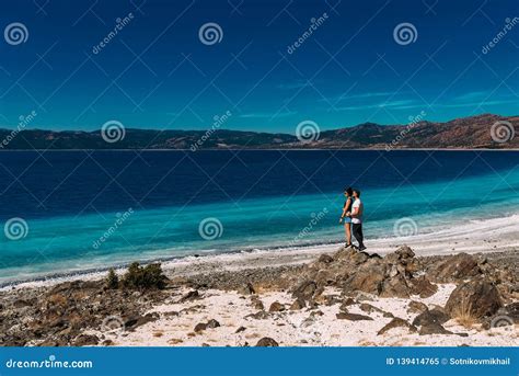 Couple In Love In The Blue Lagoon Lovers On The Coast Boy And Girl In