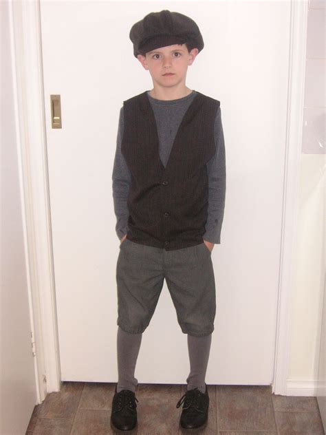 A News Boy Cap And Vest Made Out Of An Old Pair Of Mens Trousers