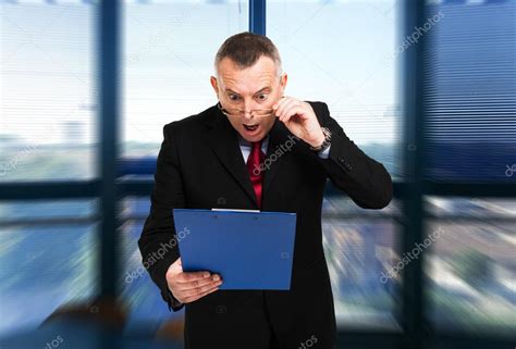 Shocked Businessman — Stock Photo © Minervastock 32390037