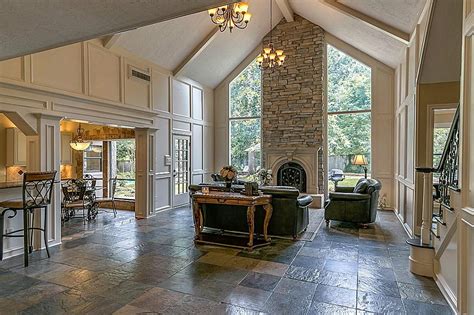 The Grandness Of The Stack Stone Cathedral Fireplace Is Captured As You