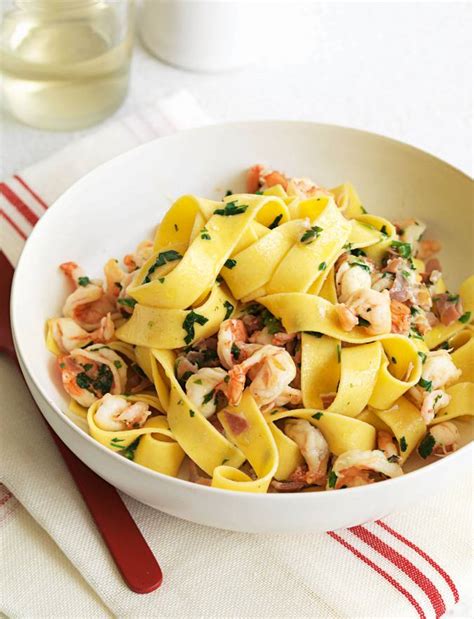 Tagliatelle with prawns, Parma ham and parsley | Sainsbury's Magazine