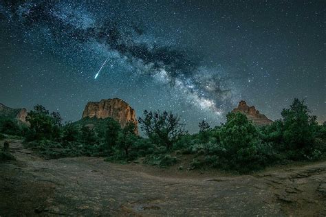 May A Meteor And Milky Way Galaxy Stretch Across The Night Sky Sedona S Arizona