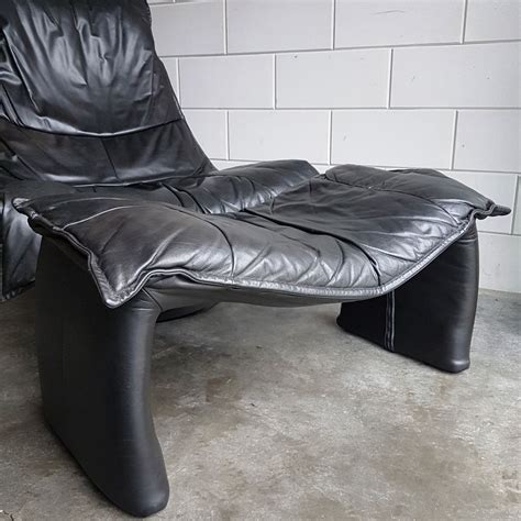 A large sofa and a bed in one is a perfect solution for any interior. Vintage Large Black Leather Swivel Lounge Chair with ...