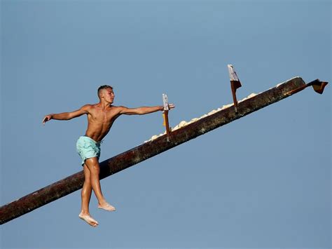 Traditional Greasy Pole Climbing Competition Takes Place In Malta Gma