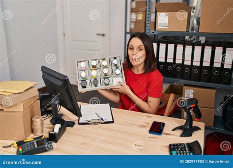 Young Hispanic Woman Working At Small Business Ecommerce Selling