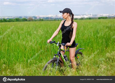 Sexy Brunette Rides Her Bike Free Time Stock Photo By Fly Wish 269521126