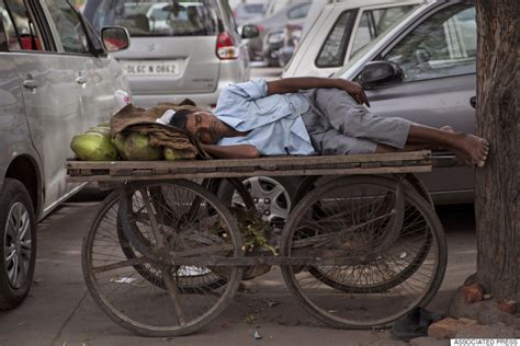 Photos Of Indias Deadly Heat Wave Show People Seeking Respite From The