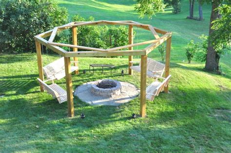 Large scale fire pit blueprint. Man Drives 6 Posts Into The Ground In His Backyard To ...
