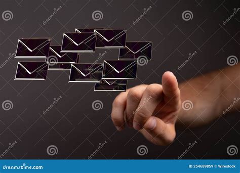 3d Rendered Electronic Mail Hovering In Mans Hand Stock Image Image