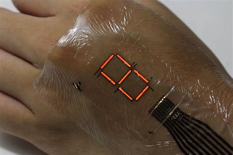 Super Thin Electronic Skin Lights Up A Digital Display On Your Hand