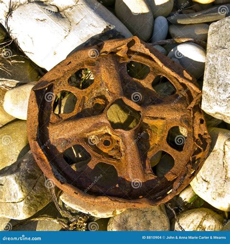 Rusty Car Wheel Rim With Stones Stock Photo Image Of Steel Wheels