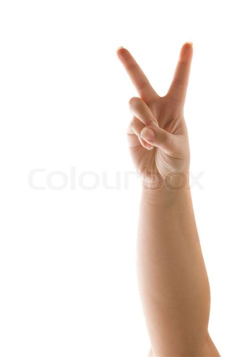 A Hand Holding Up The Peace Sign Or Stock Image Colourbox