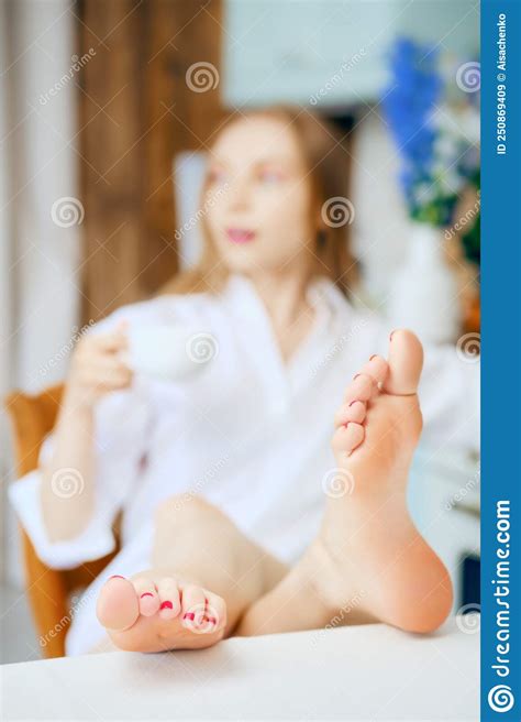 Closeup View Of Female Feet On Kitchen Table Stock Image Image Of Enjoy Cheerful 250869409