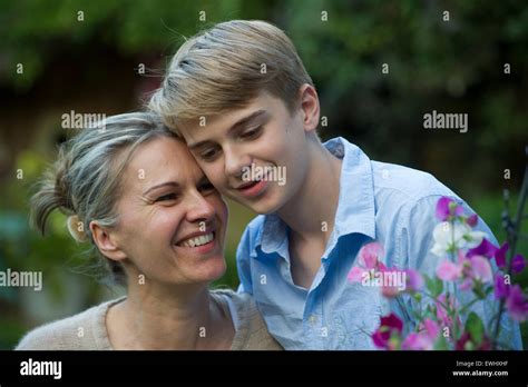 A Mother And Son Share A Touching Moment In Their Garden In London