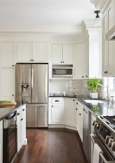 White shaker cabinets with black hardware. 30+ Kitchens with White Cabinets and Black Granite (Photos) | Shaker style kitchen cabinets ...