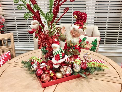 This has been a big part of our static display and continues to be huge hit with the kids durring the animated shows, however last year he stopped dancing and needed repair. Christmas table top decor Mark Roberts elf Santa fairy ...