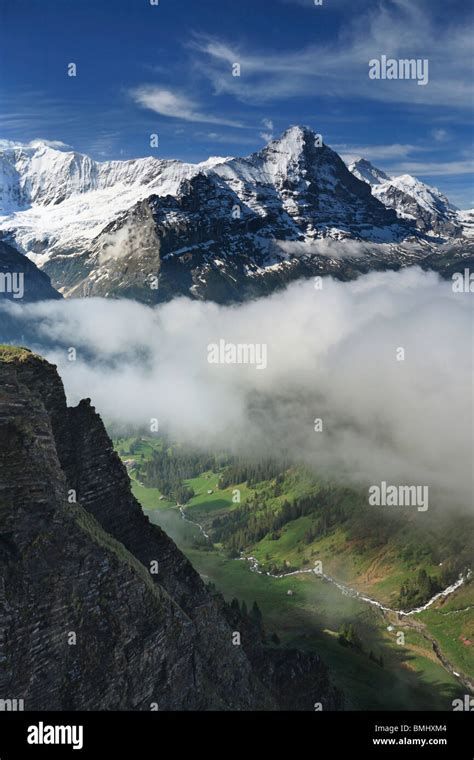 View Of The Eiger Across A Mist Shrouded Grindelwald Valley As Seen