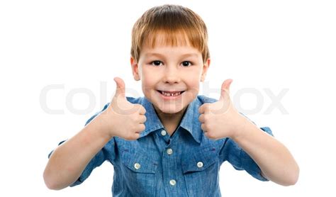 Portrait Of Beautiful Little Boy Giving You Thumbs Up Over White