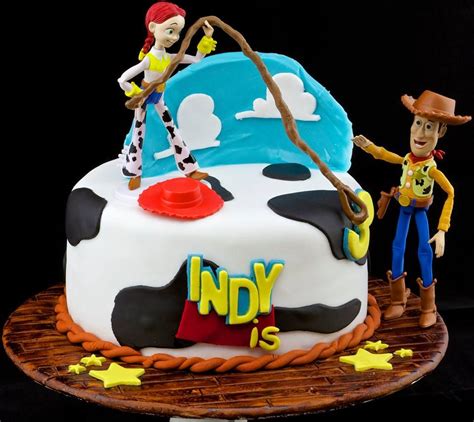 Indys Toy Story Caketopped With Plastic Jessie And Woody Figurines