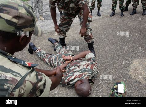 Cameroon Army Soldiers Demonstrate Infantry Tactics During Central