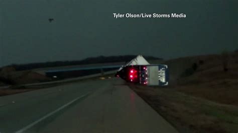 incredible video shows semi truck blown over during storm in illinois