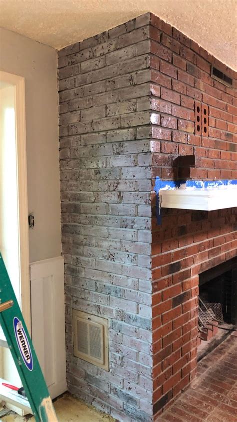 An Outdated Red Brick Fireplace Gets An Amazing Transformation