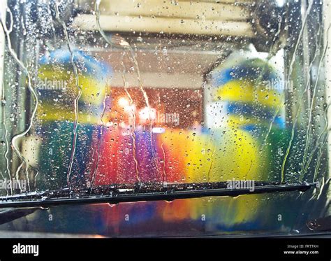 Car Wash Service With The Colorful Automotive Brushes Stock Photo Alamy