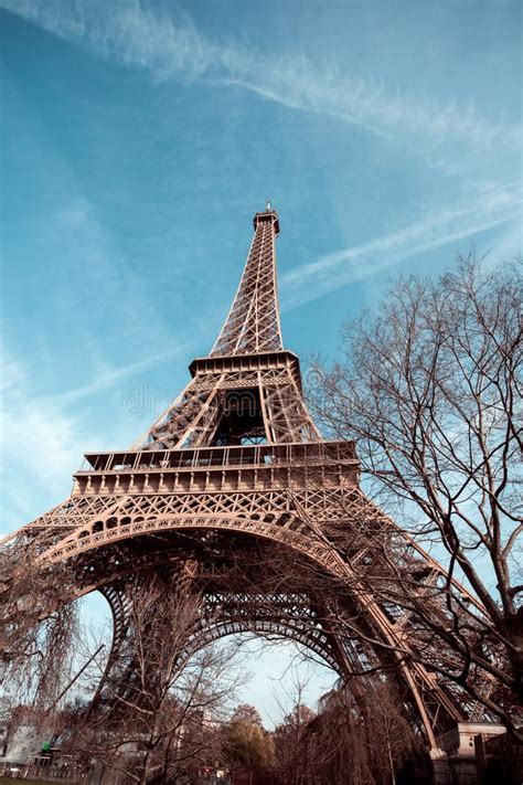 Wide Shot Of Eiffel Tower With Blue Sky In Paris Stock Photo Image Of