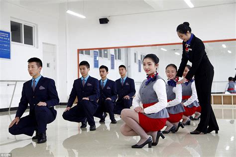 Chinese Flight Attendants Practise Graceful Grin With A Chopstick Between Their Teeth Daily