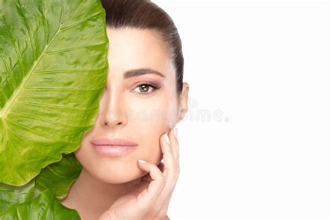 Skin Care Concept Woman Touching Her Face Behind Leaf Spa Beauty