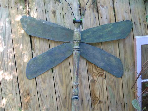 Dragonfly Made From Ceiling Fan Blades And Table Leg Ceiling Fan Crafts Ceiling Fan Art