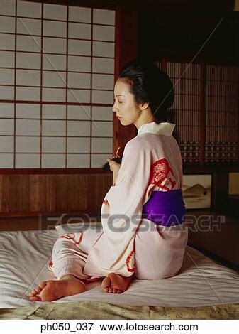 Picture Of Japanese Woman In Kimono Sitting On Mattress Ph Search Stock Photography