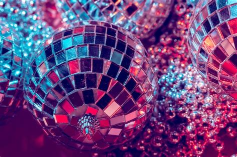 Premium Photo Disco Balls For Decorationof A Party On Pink Background