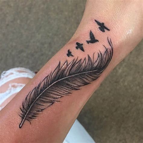 Beautiful Looking Feather Tattoo Designs With Their Meaning Body